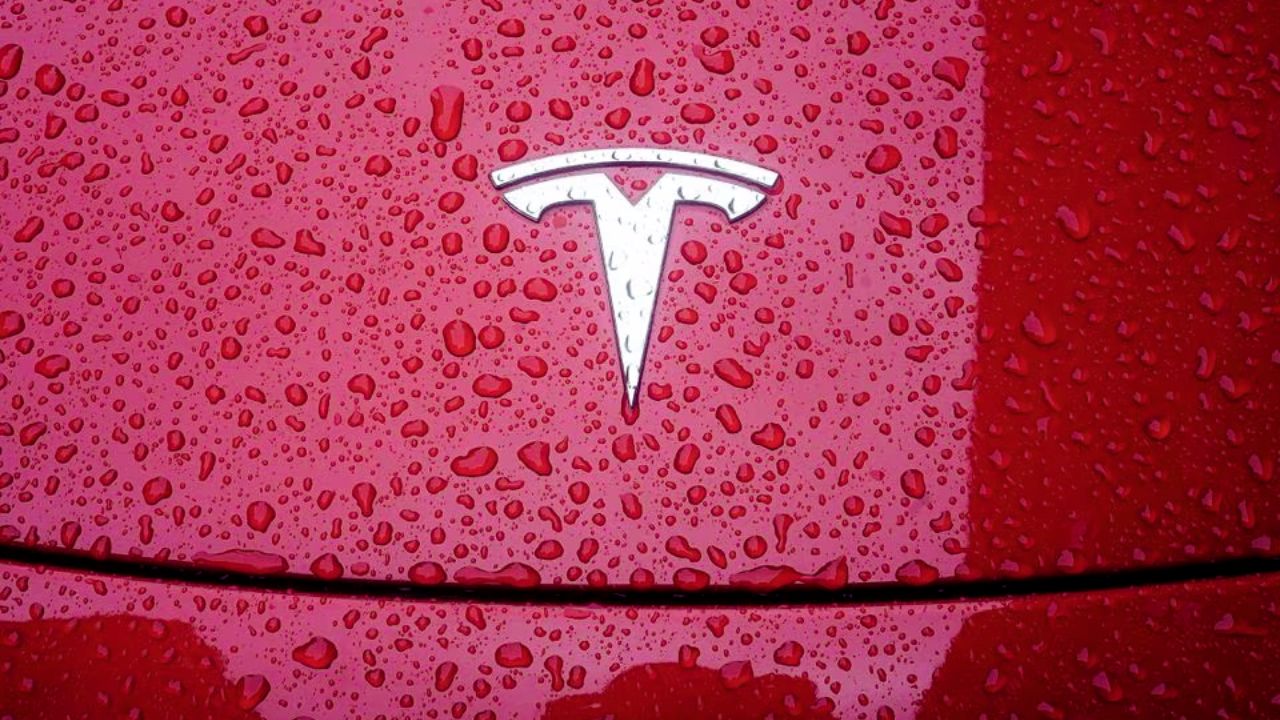 Wall Street Reacts with Caution as Tesla's Red-Hot Rally Spurs Downgrades